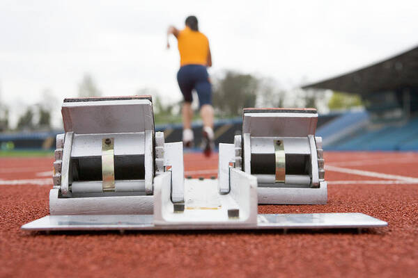 Human Poster featuring the photograph Athletics Starting Blocks by Gustoimages/science Photo Library