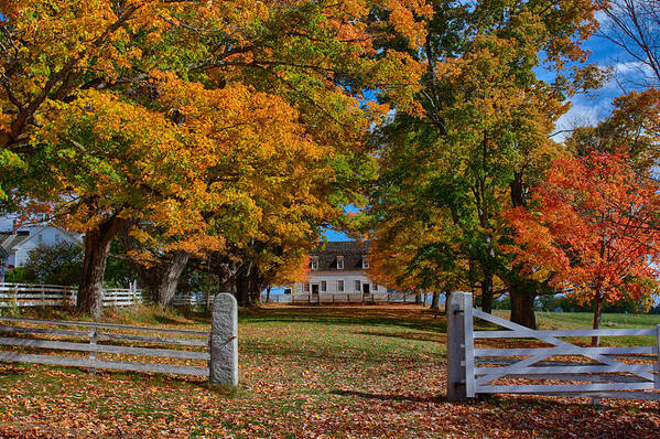 Canterbury Shaker Village Poster featuring the photograph Autumn colors above meetinghouse by Jeff Folger