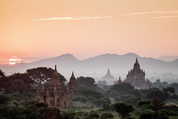 Non-urban Scene Poster featuring the photograph Bagan, Sunrise Over Ancient Temples by Martin Puddy