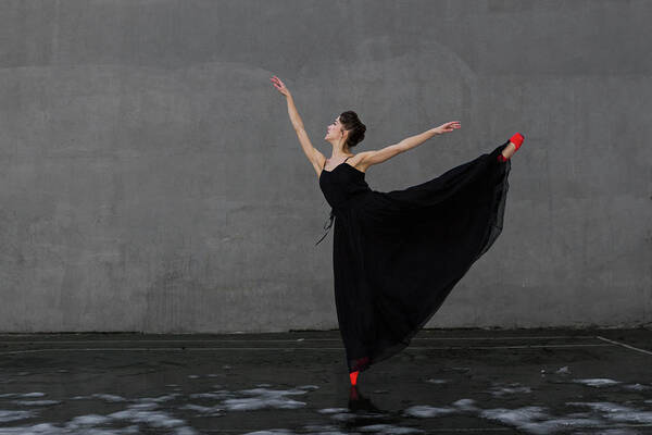 Ballet Dancer Poster featuring the photograph Ballerina Performing 1st Arabesque by Nisian Hughes