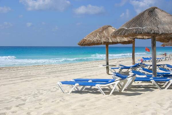 Beach Poster featuring the photograph Beach chairs in Cancun by Jane Girardot