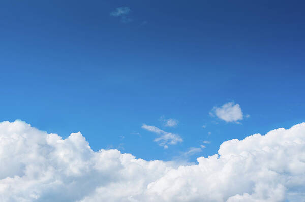 Scenics Poster featuring the photograph Blue Sky With Dramatic White Clouds by Primeimages