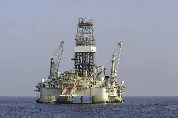 Oil Poster featuring the photograph Blue Water Oil Rig by Bradford Martin