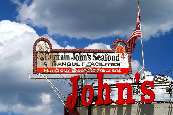 Captain's John Seafood Poster featuring the photograph Captain John's Restaurant Sign by Valentino Visentini