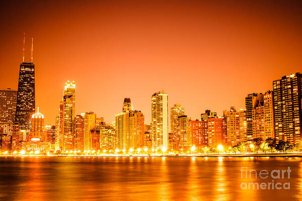 2012 Poster featuring the photograph Chicago Skyline at Night with Orange Sky by Paul Velgos