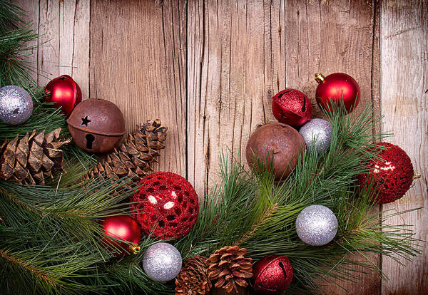 Background Poster featuring the photograph Christmas ornaments on wooden background by Jennifer Huls