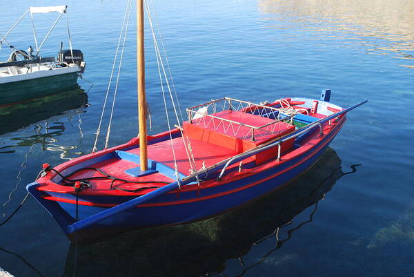 Boat In Clear Waters Poster featuring the photograph Clear Waters by George Katechis