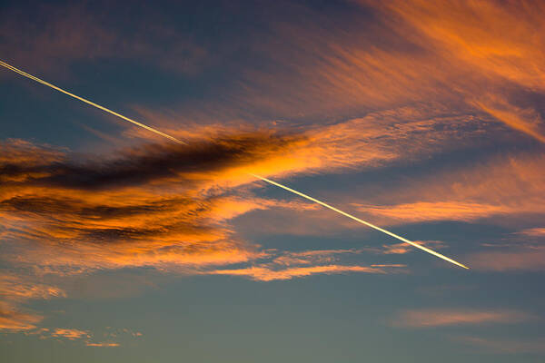 Airplane Poster featuring the photograph Cloudy Evening Sky With Airplane by Andreas Berthold