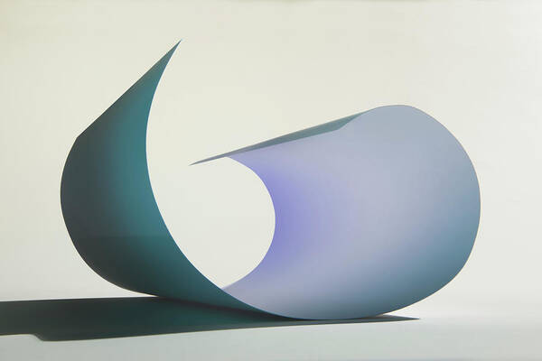 Curve Poster featuring the photograph Curved Sheet Of Paper by Paul Taylor