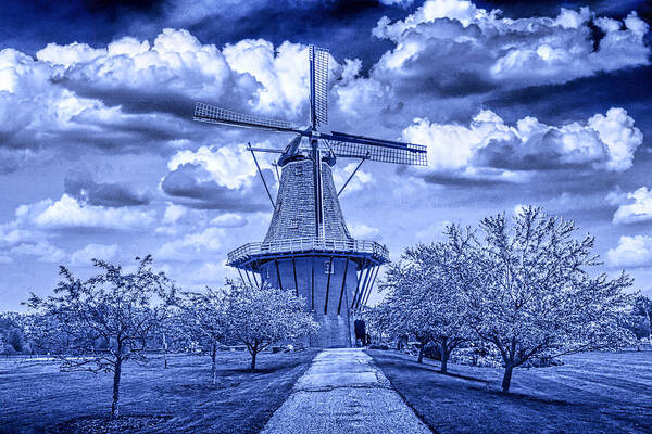 Art Poster featuring the photograph deZwaan Holland Windmill in Delft Blue by Randall Nyhof