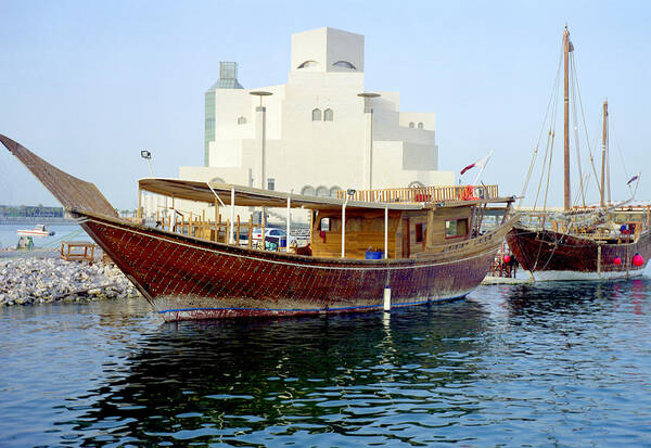 Dhow Poster featuring the photograph Doha dhows and Islamic Art Museum by Paul Cowan