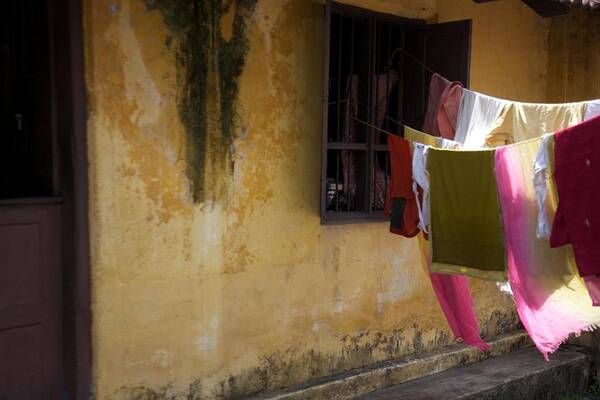 Cochin Poster featuring the photograph Drying In The Sun by Lee Stickels