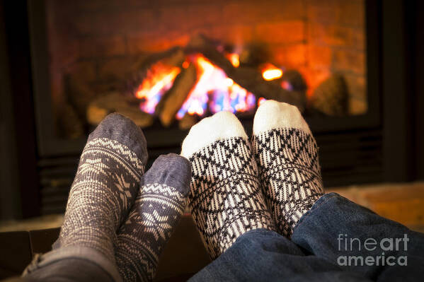 Feet Poster featuring the photograph Feet warming by fireplace by Elena Elisseeva