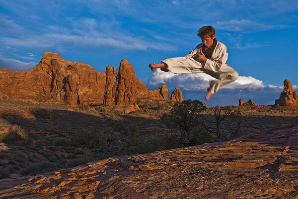 Taekwondo In Arches Poster featuring the photograph Flying High by Nichon Thorstrom
