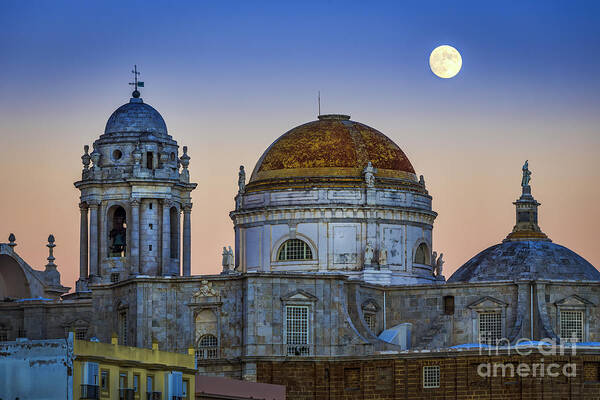 Andalucia Poster featuring the photograph Full Moon Rising Over the Cathedral Cadiz Spain by Pablo Avanzini