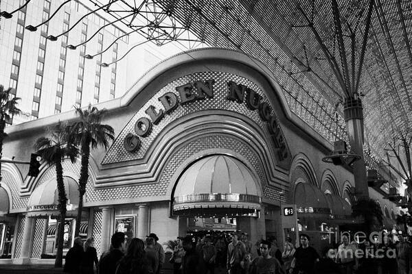 Golden Poster featuring the photograph golden nugget casino hotel in freemont street Las Vegas Nevada USA by Joe Fox