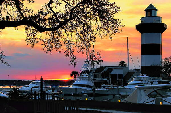 Lighthouse Poster featuring the photograph Harbour Town Sundown by Dale Kauzlaric