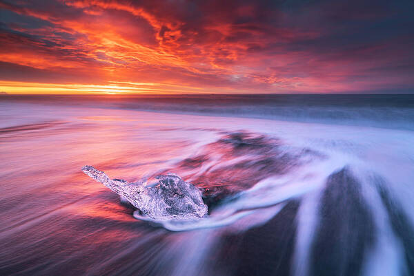 Seascape Poster featuring the photograph Ice And Fire II by Jingshu Zhu