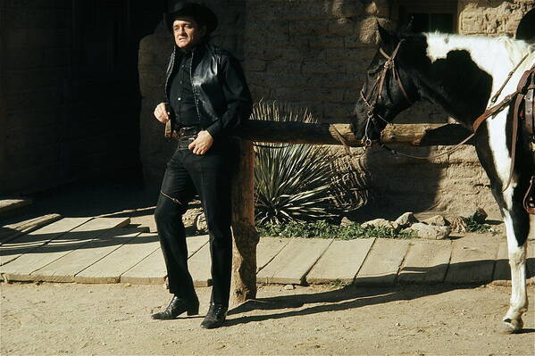 Johnny Cash Horse Railing Old Tucson Az A Gunfight Poster featuring the photograph Johnny Cash horse Old Tucson Arizona 1971 by David Lee Guss