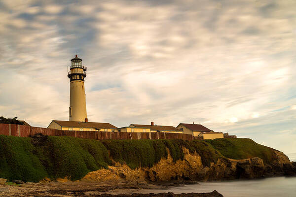 Clouds Poster featuring the photograph Lighthouse and Clouds by Janet Kopper