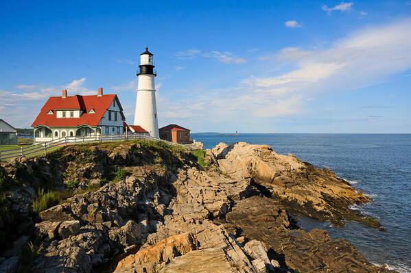 Lighthouse Poster featuring the photograph Lighthouse in the sun by Sue Leonard