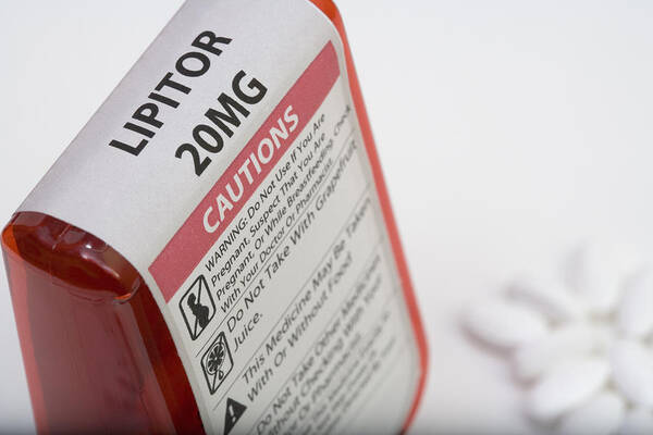 Ldl Poster featuring the photograph Lipitor Warning Label by Science Stock Photography
