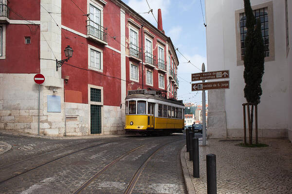 Tram Poster featuring the photograph Lisbon Tram Route 12 in Portugal by Artur Bogacki
