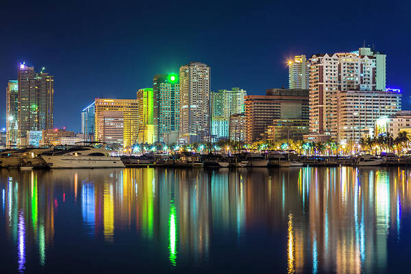 Outdoors Poster featuring the photograph Manila City Skyline At Night by Stuart Dee