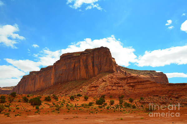 Monument Valley Poster featuring the photograph Monument Valley Rock Formation and Clouds by Debra Thompson