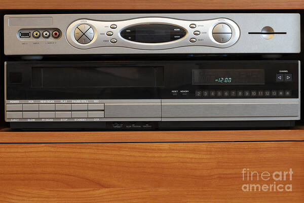 New Poster featuring the photograph New DVR with Old VCR by Lee Serenethos