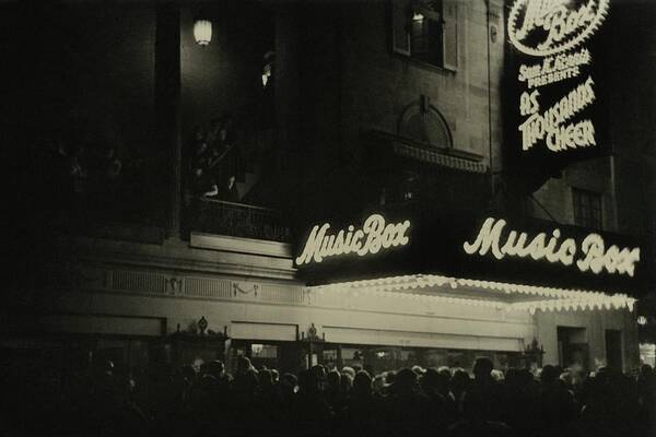 Party Poster featuring the photograph Outside The Music Box Theatre by Remie Lohse