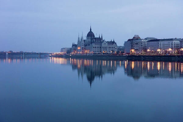 Tranquility Poster featuring the photograph Parliament Building In Budapest At Dawn by G.g.bruno