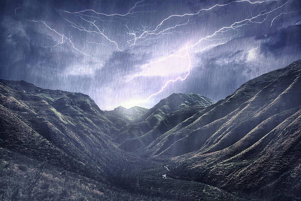 Environmental Conservation Poster featuring the photograph Raging Over The Mountains by Yuri arcurs
