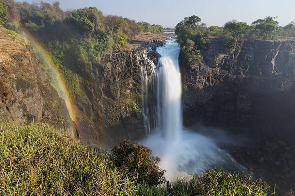 Vincent Grafhorst Poster featuring the photograph Rainbow In The Mist Of Victoria Falls by Vincent Grafhorst