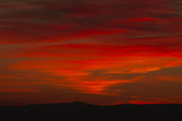 Red Poster featuring the photograph Red Sunrise Over Big White Mountain by Laura Tucker