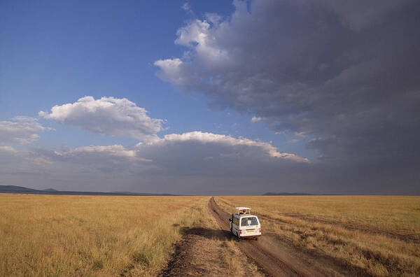 Feb0514 Poster featuring the photograph Safari On The Serengeti by Gerry Ellis