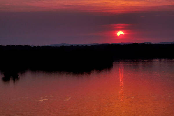 Solar Eclipse Poster featuring the photograph Solar Eclipse Sunset by Jason Politte