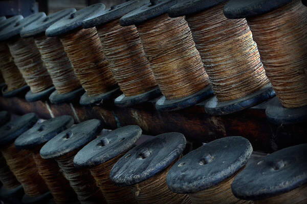 Spools Poster featuring the photograph Spools in a Row by Nadalyn Larsen