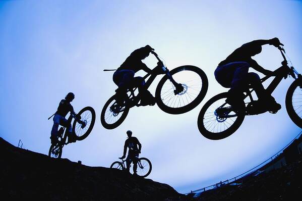 Track Poster featuring the photograph Stunt Cyclists, Alberta, Canada by Corey Hochachka