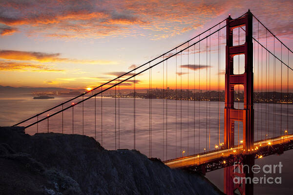 Sunrise Poster featuring the photograph Sunrise over the Golden Gate Bridge by Brian Jannsen