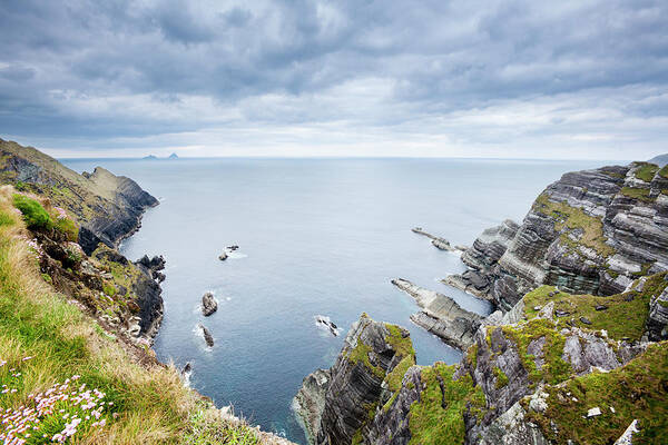 Water's Edge Poster featuring the photograph The Cliffs Of Drumgour, County Kerry by Jorg Greuel