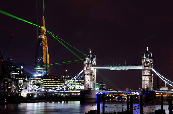 Gothic Style Poster featuring the photograph The Shard Skyscraper Opening Laser by Dynasoar