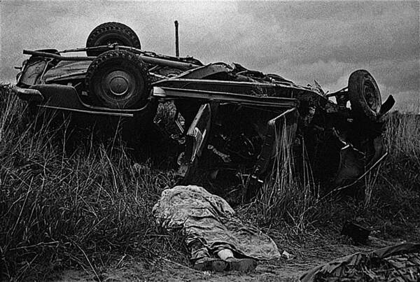 Upended Car Accident Dead Body Aberdeen South Dakota 1964 Black And White Poster featuring the photograph Upended car accident dead body Aberdeen South Dakota 1964 black and white by David Lee Guss
