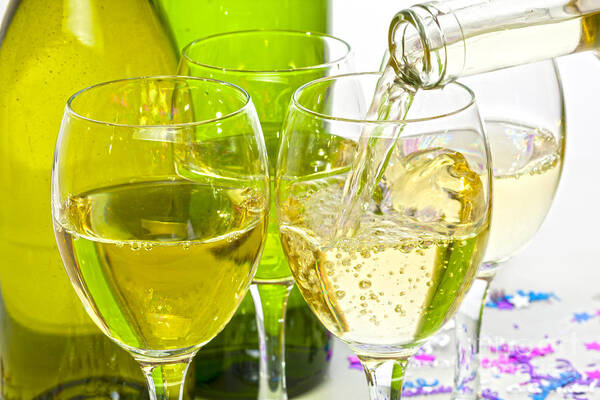 White Poster featuring the photograph White Wine Pouring into Glasses by Colin and Linda McKie