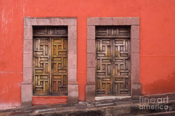 Color Poster featuring the photograph Wooden Doors on Orange Wall by Oscar Gutierrez