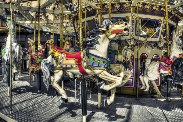 Fun Poster featuring the photograph Xmas Carousel by Wayne Sherriff