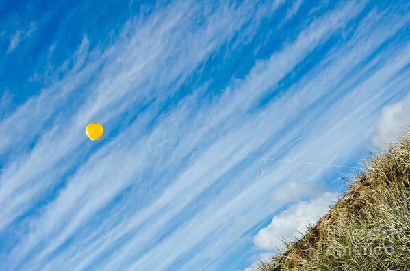 Balloon Poster featuring the photograph Yellow balloon in the Blue sky by Yurix Sardinelly