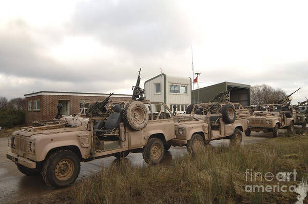 Foreign Military Poster featuring the photograph A Pink Panther Land Rover #1 by Andrew Chittock