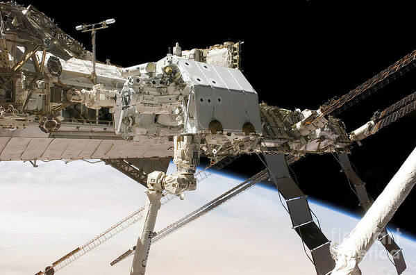 Canadarm2 Poster featuring the photograph The Canadian-built Dextre Robotic #2 by Stocktrek Images