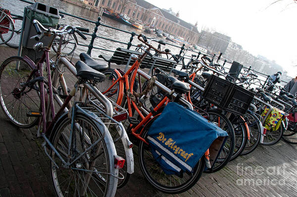 Along The River Poster featuring the digital art Bikes in Amsterdam by Carol Ailles